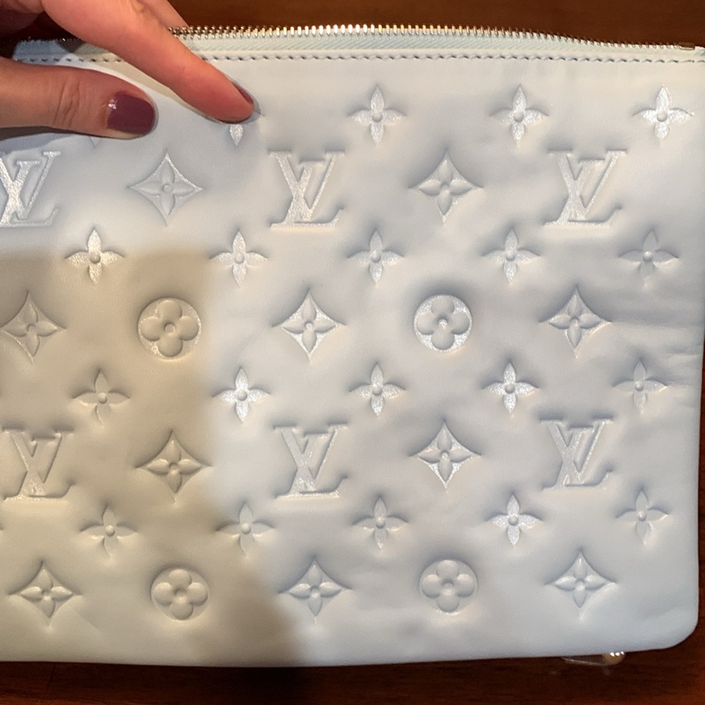 Authentic Brand new Louis Vuitton baby blue color Embossed Leather Chain purse.